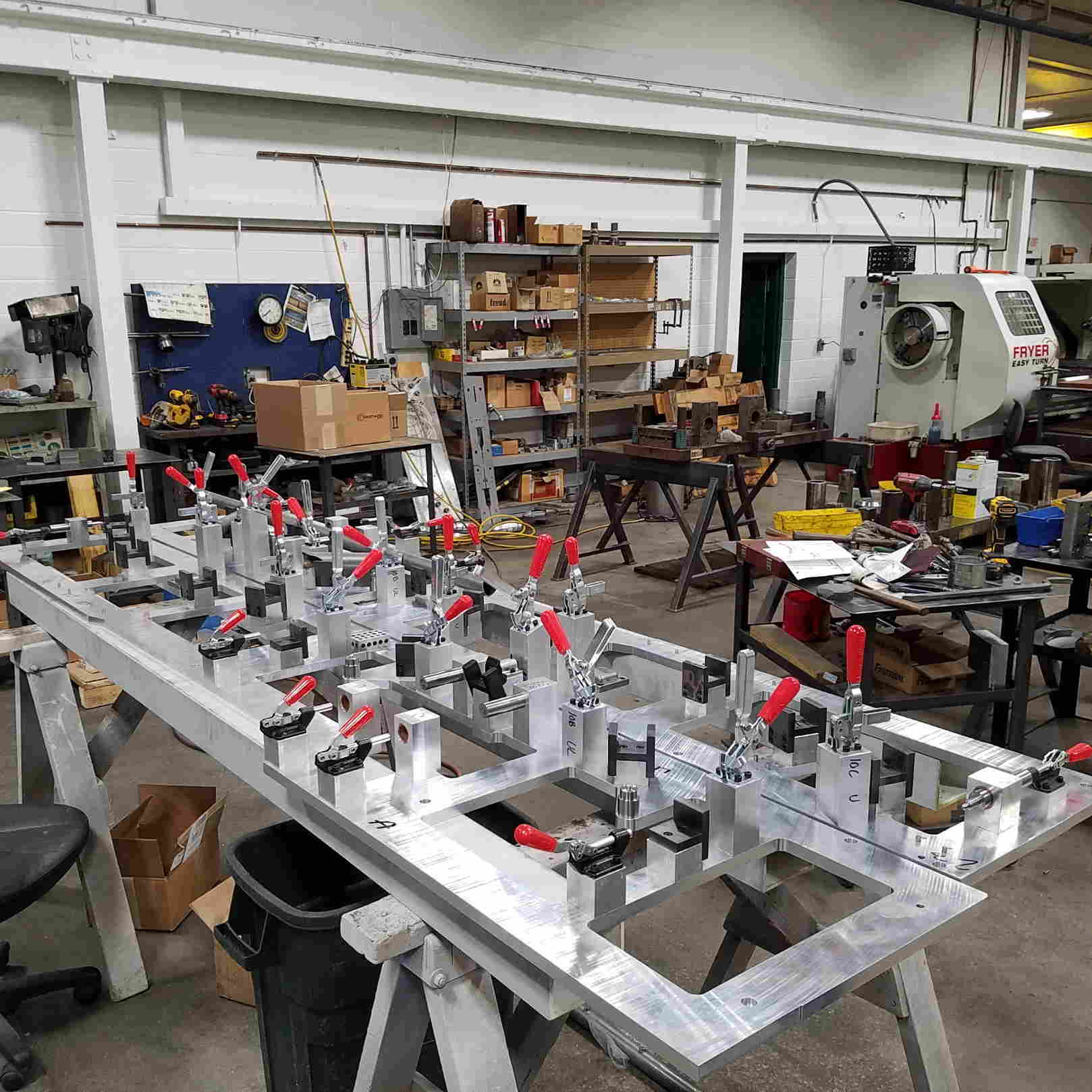 Welding Fixture in our assembly area, fixtures in foreground